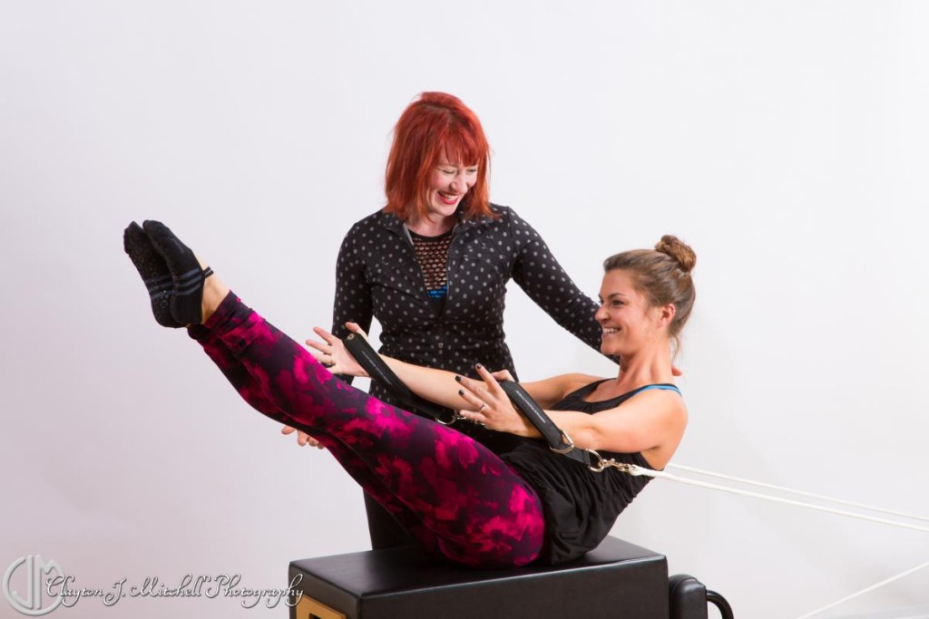 pilates student and instructor photograph