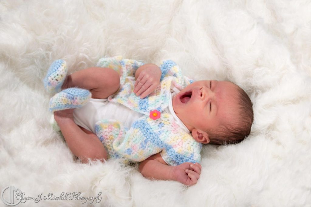 newborn baby yawning studio photography