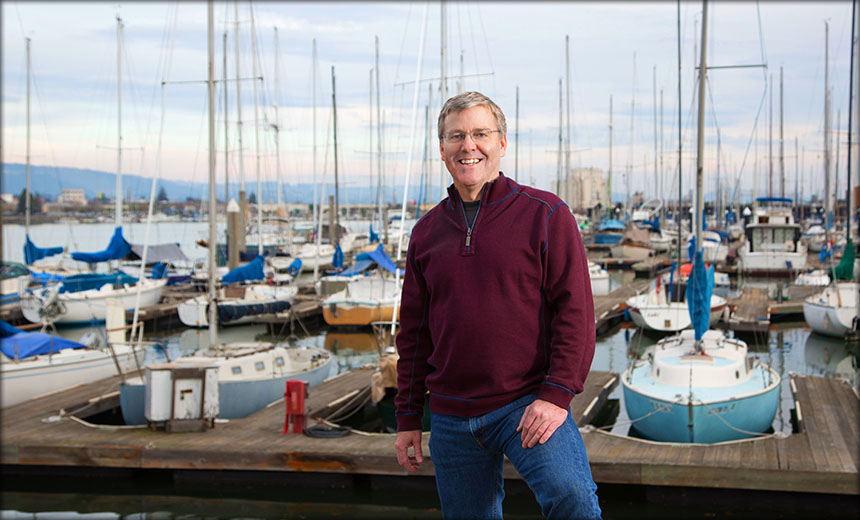 Lifestyle portrait of accountant at a marina
