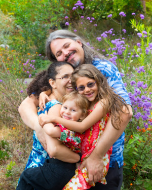 Family hugging warmly