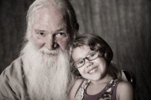 Desaturated Grandpa and granddaughter Studio photo
