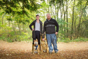 Brother and Sister portrait with their Dogs