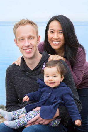 Outdoor family of three with SF Bay background