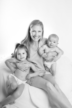 High key black and white mom and two kids in studio