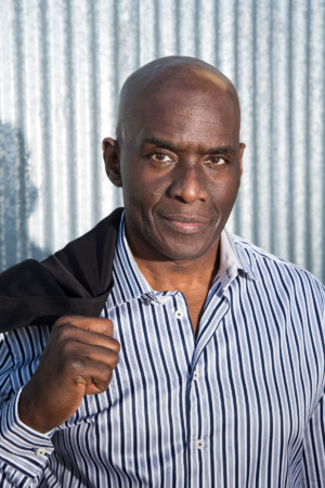 Classic Jacket over shoulder Black Male Headshot