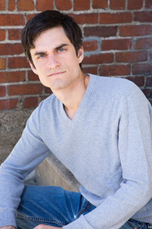 Man with blue eyes midrange headshot pose