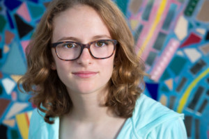 Girl with glasses on Mosaic wall