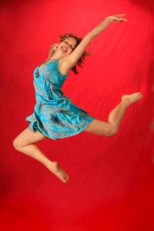 Dancing jump shot Senior Portrait on Red