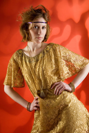 Girl in Gold with psychedelic orange background