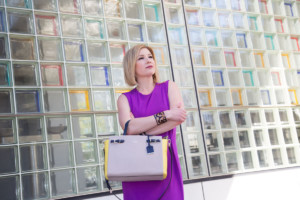 Woman in purple dress at Yerba Buena Center