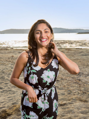 Laughing woman on crown beach