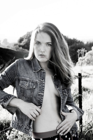 Desaturated girl in pasture editorial image