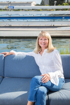 Lifestyle portrait of woman at Lake Chalet, Oakland
